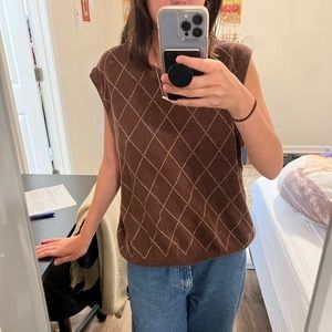 brown sweater vest